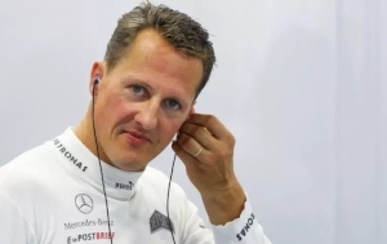 Michael Schumacher raspunde la intrebari doar prin miscarile capului